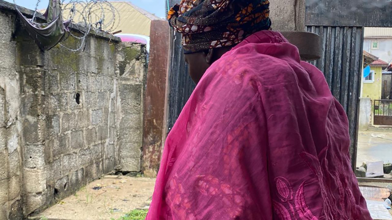 "Adesola" where her son is buried, pictured in Lagos on Oct. 16, 2021. Her son was one of the protesters killed at Lekki toll gate last year.