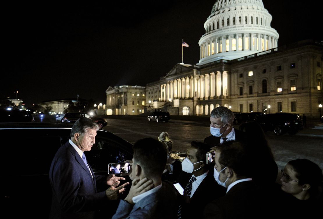 Sen. Joe Manchin of West Virginia speaks to reporters in early October.