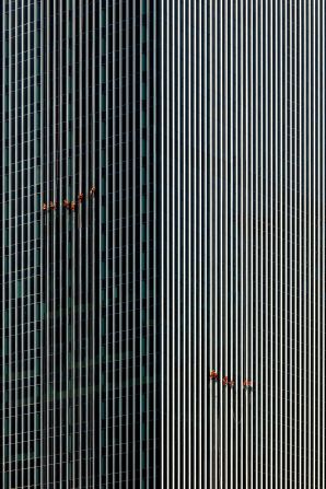 Kevin Siyuan photographed window cleaners scaling the CapitaSpring building in his native Singapore.