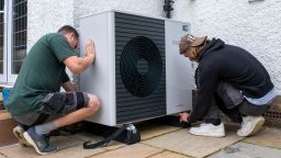 Air source heat pump installers from Solaris Energy installing a Vaillant Arotherm plus 7kw air source heat pump unit into a 1930s built house in Folkestone, United Kingdom on the 20th of September 2021.  With gas prices increasing and the increasing need to reduce fossil fuel air source heat pumps are slowly starting to replace the gas boiler use in properties in the UK. (photo by Andrew Aitchison/In pictures via Getty Images)