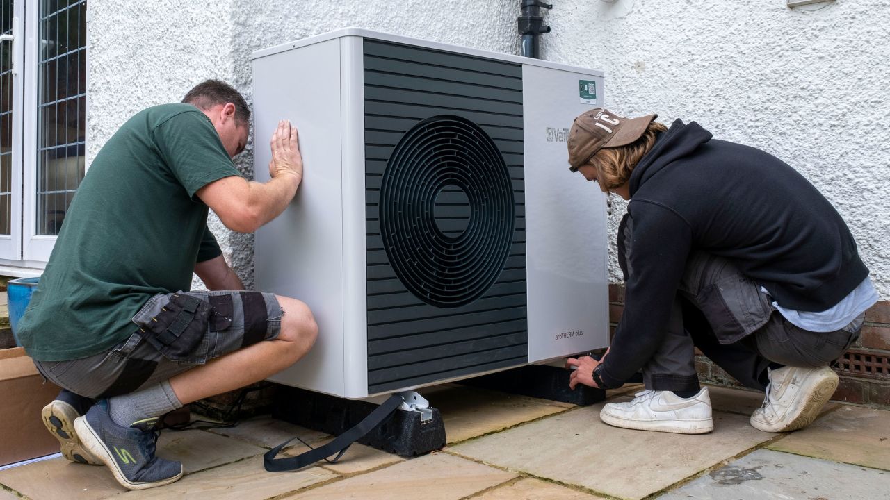 Workers from Solaris Energy installing an air source heat pump into a house in Folkestone, United Kingdom.