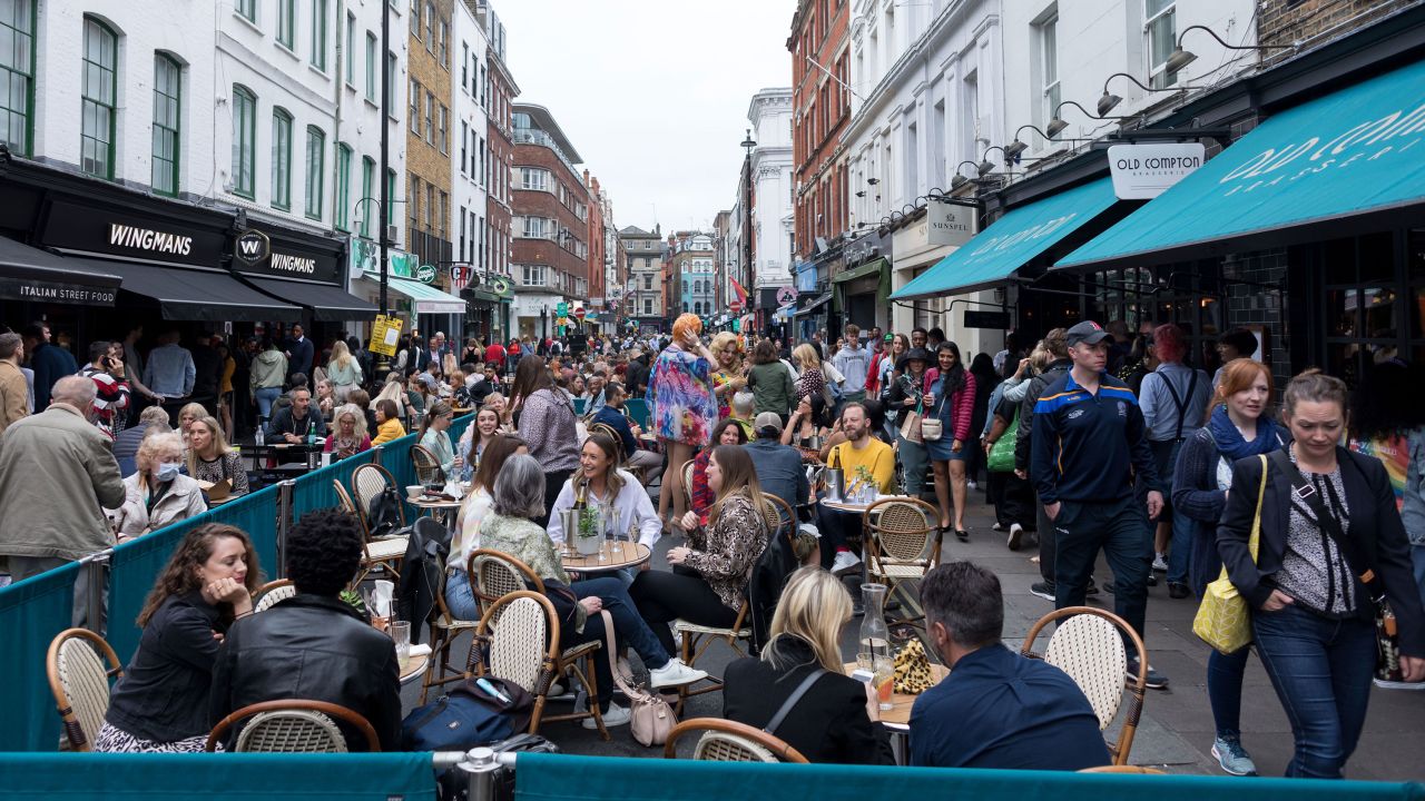 Diners in London after the UK's restrictions were lifted this summer.