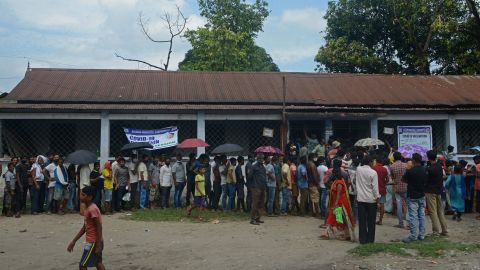 People queue for the Covishield vaccine in Siliguri, West Bengal, on October 1, 2021. 