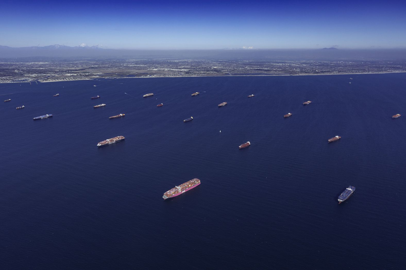 Container ships are moored on October 9 off the Los Angeles and Long Beach ports in California.