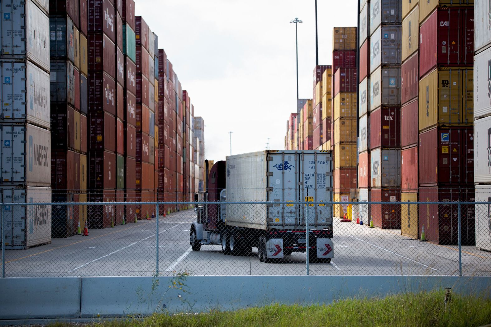 An 18-wheeler enters one of the main shipping container corridors on October 12 at The Port of Houston in Texas.