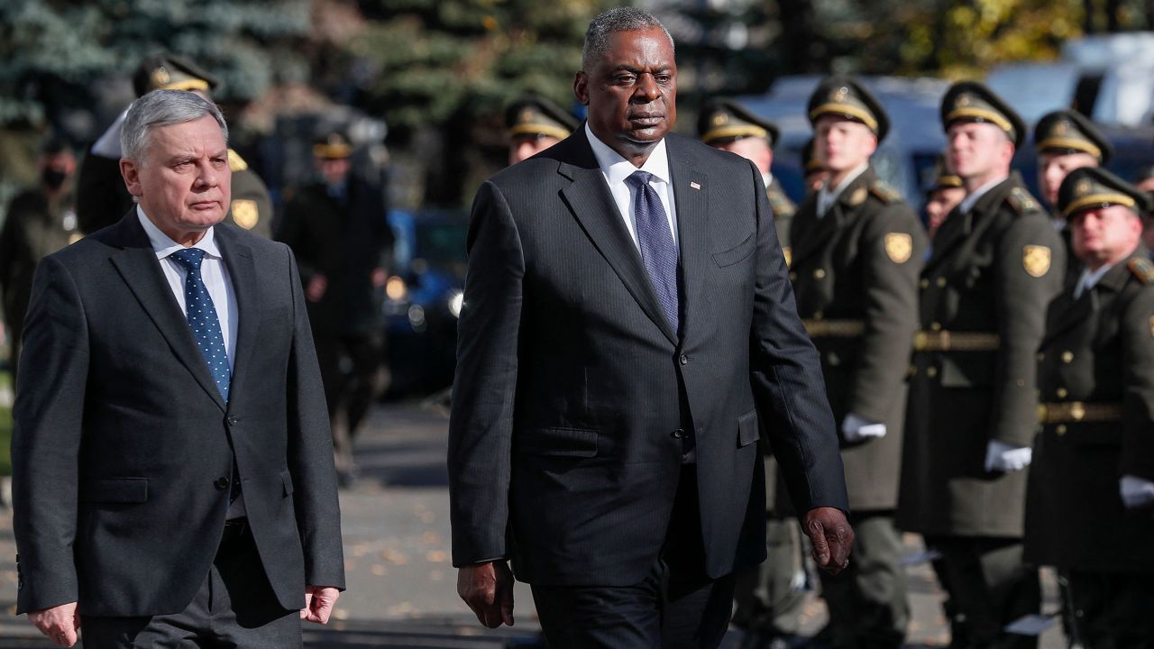 US Defense Secretary Lloyd Austin and Ukrainian Defence Minister Andriy Taran walk past honor guards during a welcoming ceremony before their meeting in Kiev on October 19, 2021.