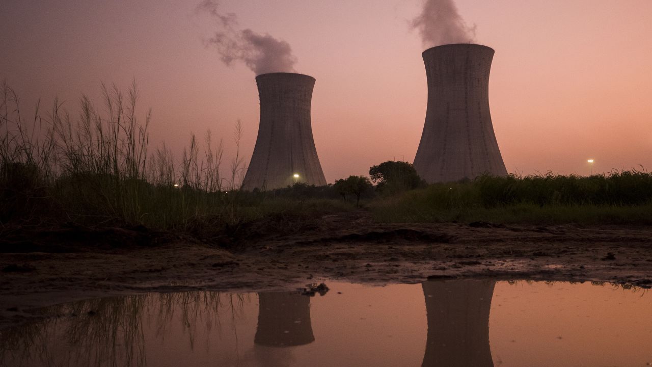 The cooling stacks at a coal-fired power plant in Uttar Pradesh, India. A report from the UN shows countries like India are planning to produce more fossil fuels in the next decade than what they can afford under current climate commitments.