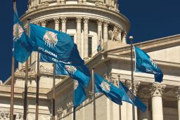 The state flag flies at the Oklahoma State Capitol in Oklahoma City in 2018.