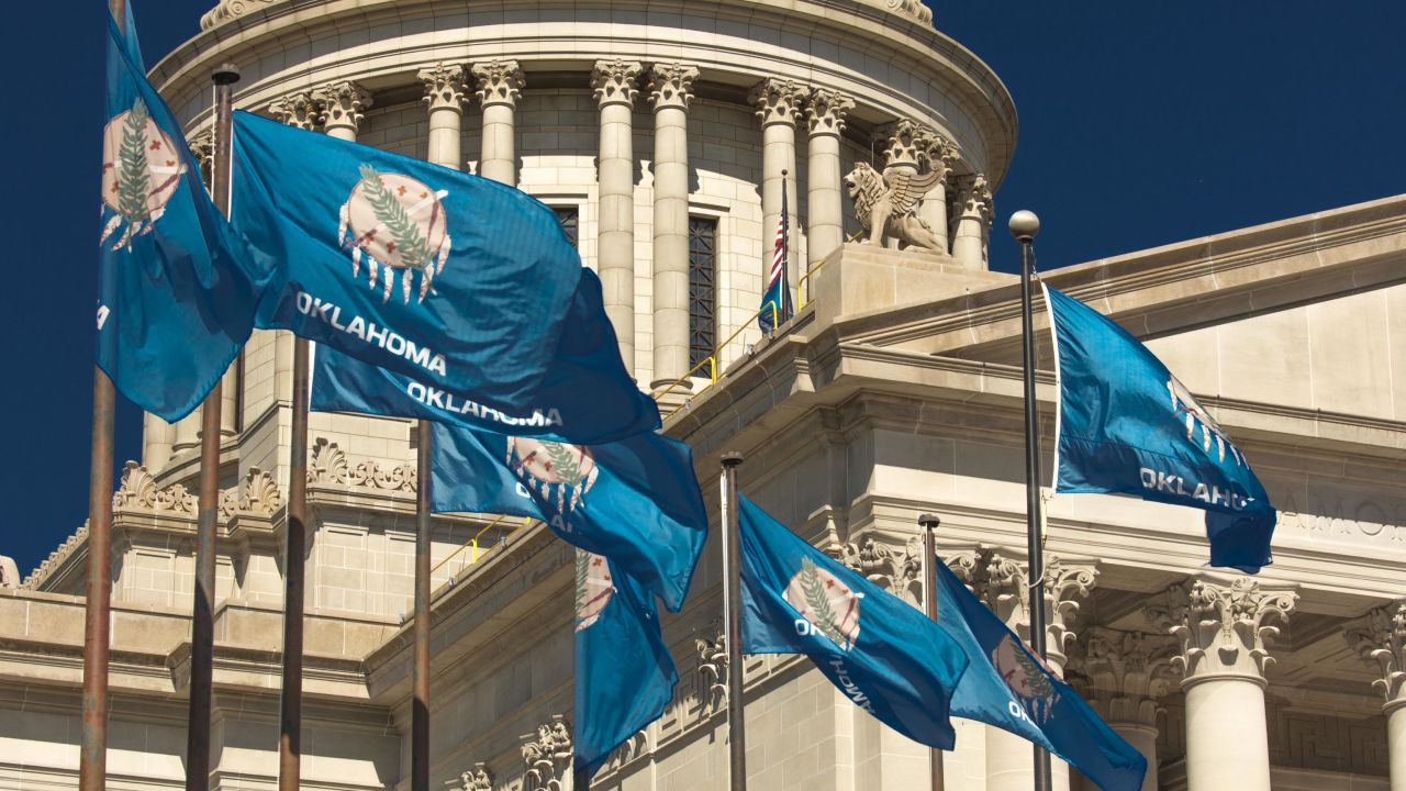 The state flag flies at the Oklahoma State Capitol in Oklahoma City in 2018.