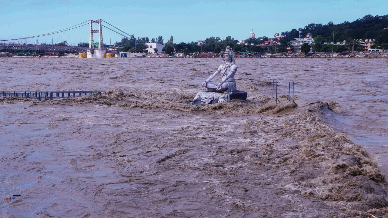 A statue of the Hindu god Lord Shiva amid the flooded River Ganga in Rishikesh, Uttarakhand, India, on October 19.