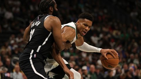 Antetokounmpo is defended by James Harden of the Brooklyn Nets.