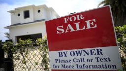 A "For Sale" sign outside a house in West Palm Beach, Florida, U.S., on April 7, 2021. 