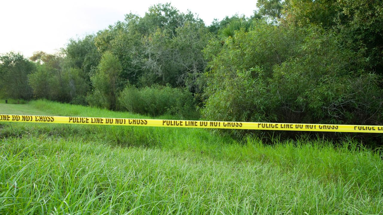 Police tape restricts access to Myakkahatchee Creek Environmental Park on October 20.