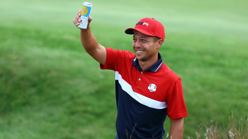 KOHLER, WISCONSIN - SEPTEMBER 26: Xander Schauffele of team United States celebrates their 19 to 9 win over Team Europe with a drink during Sunday Singles Matches of the 43rd Ryder Cup at Whistling Straits on September 26, 2021 in Kohler, Wisconsin.   (Photo by Richard Heathcote/Getty Images)
