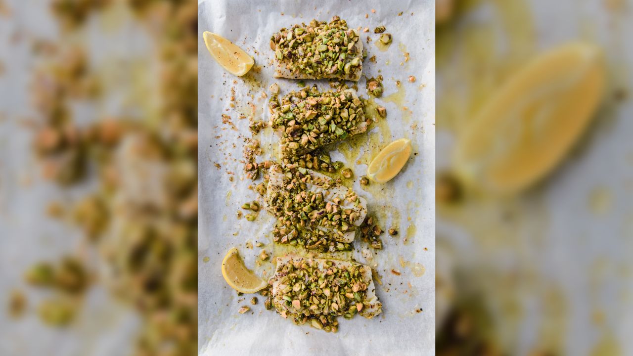It's easy to add plant-based protein and fiber into meals by replacing breadcrumb toppings with nuts, as in this cod dish.