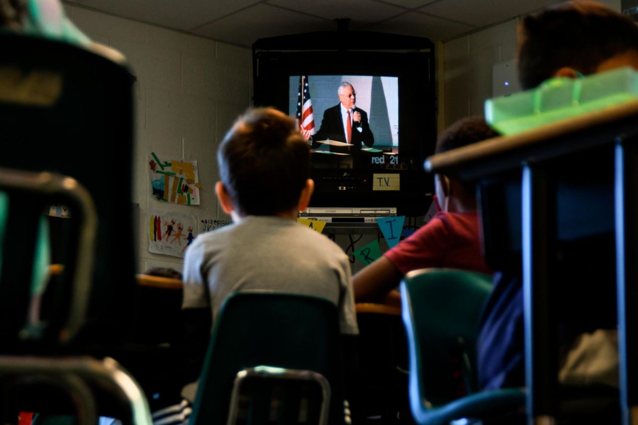 First grade students at Colin L. Powell Elementary school in Centreville, Virginia, watch a video of <a href="https://www.cnn.com/2021/10/18/politics/colin-powell-dies/index.html" target="_blank">Gen. Colin Powell</a> on Tuesday, October 19. Powell, a trailblazing military leader who went on to become the first Black secretary of state, died at the age of 84 due to complications from Covid-19, his family said. <a href="https://www.cnn.com/2021/10/18/politics/gallery/colin-powell/index.html" target="_blank">See his life and career </a>