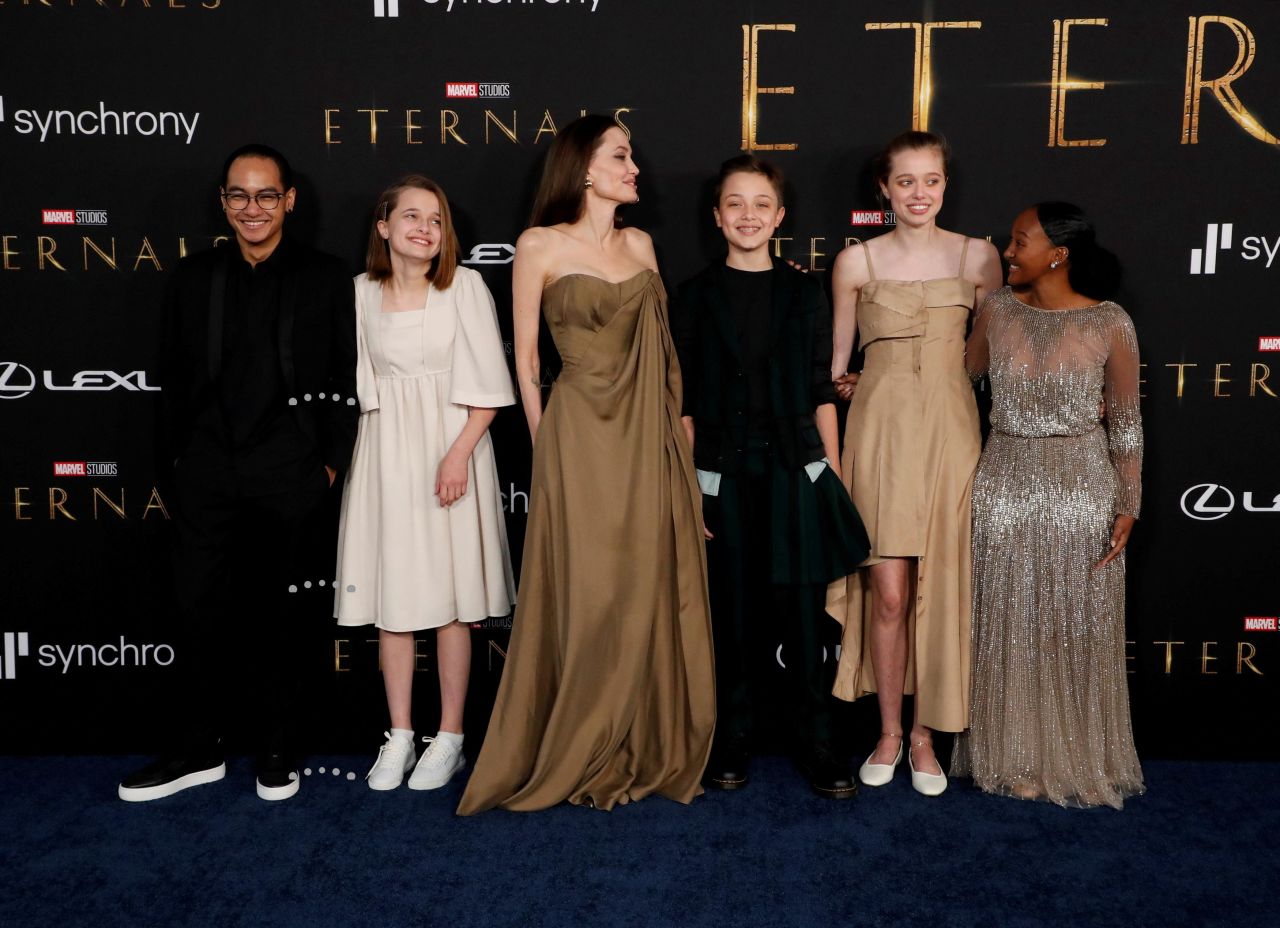Actress <a href="https://www.cnn.com/2021/10/19/entertainment/angelina-jolie-children-eternals/index.html" target="_blank">Angelina Jolie</a> poses with her children Maddox, Vivienne, Knox, Shiloh and Zahara at Marvel Studios' "Eternals" premiere on Monday, October 18, in Los Angeles, California. The actress <a href="https://www.etonline.com/angelina-jolie-reacts-to-daughter-zahara-wearing-her-2014-oscars-dress-to-eternals-premiere-173920" target="_blank" target="_blank">told "Entertainment Tonight"</a> that the family wore some classics for the event, including Zahara, who donned her mother's silver 2014 Academy Awards gown.