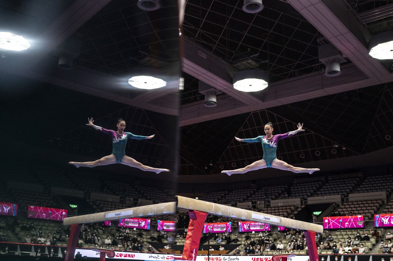 Vietnamese gymnast Thi Ngoc Huong Do competes on the balance beam during the women's team qualifying at the Artistic Gymnastics World Championships in Kitakyushu, Japan, on October 19.