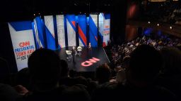 President Joe Biden, right, and CNN anchor Anderson Cooper, speak during a CNN town hall in Baltimore, Maryland, on October 21, 2021.