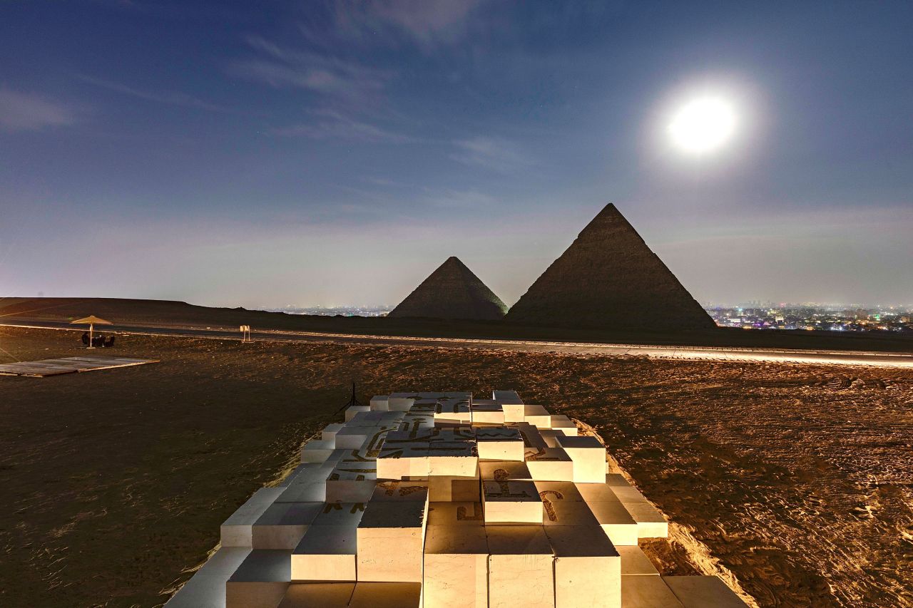 A view of Sultan bin Fahad's "R III" before the Pyramids.