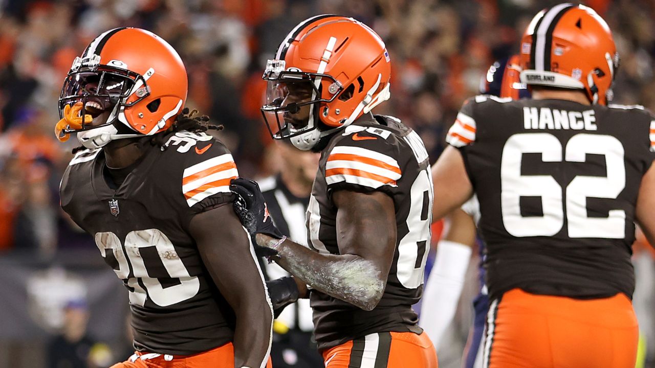 D'Ernest Johnson celebrates with wide receiver Rashard Higgins after rushing for a first quarter touchdown against the Denver Broncos.