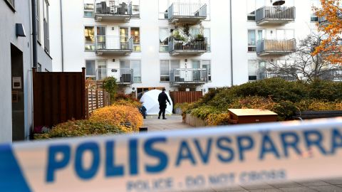 Forensic police work on the site where Swedish rapper Einar was shot, in the Hammarby Sjostad district of Stockholm, on Friday. 