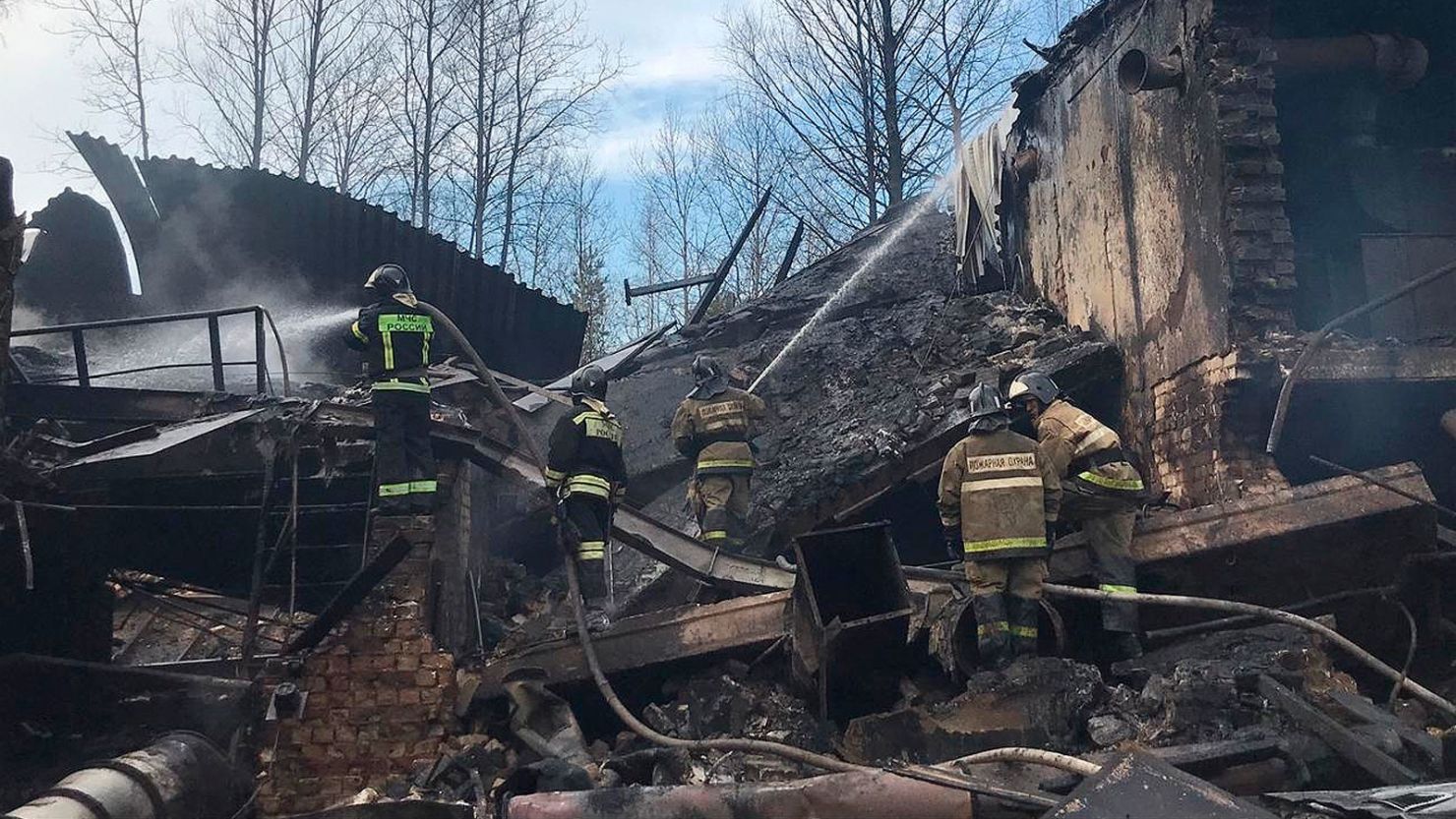 Russian officials released this photo of emergency personnel working at the site of an explosion and fire at a gunpowder factory in the Ryazan region, Russia, on Friday.