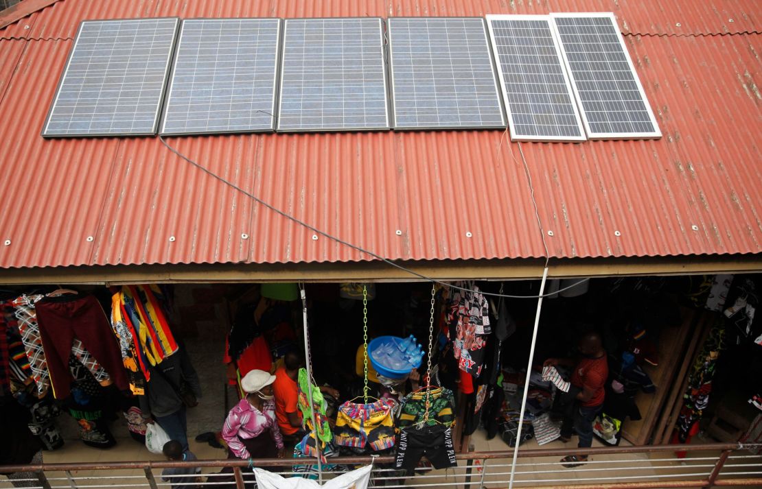 Solar panels on the rooftop of a street boutique in Lagos, Nigeria.
