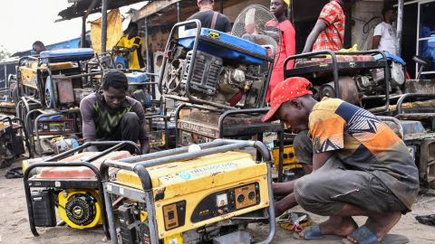 Young men work on generators at a workshop in Maiduguri in Nigeria's northeast.