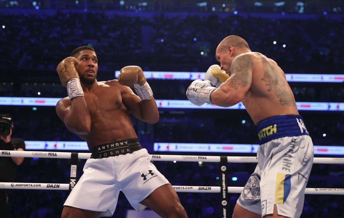 Usyk (right) and Joshua fought in London in September. 