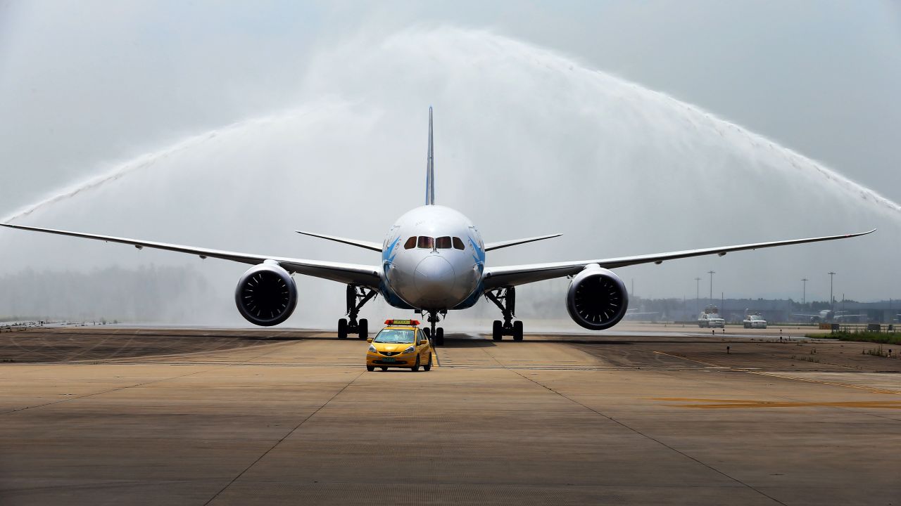 <strong>Arriving in China: </strong>China's first Boeing 787 Dreamliner delivered to China Southern Airlines receives a ceremonial water salute upon arrival at the airport in Guangzhou, Guangdong province, on June 2, 2013. 