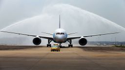 China's first Boeing 787 Dreamliner delivered to China Southern Airlines receives a ceremonial water salute upon arrival at the airport in Guangzhou, southern China's Guangdong province on June 2, 2013. China's first Boeing 787 arrived in the country on June 2, state-run media said, less than two weeks after Beijing regulators approved the aircraft, which had faced safety problems.   CHINA OUT      AFP PHOTO (Photo by STR / AFP) (Photo by STR/AFP via Getty Images)