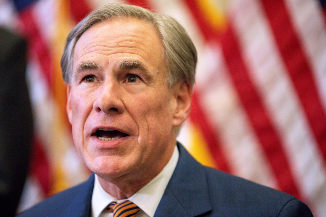 Texas Gov. Greg Abbott, photographed in June, says the trafficking of people and drugs across the border is rife.