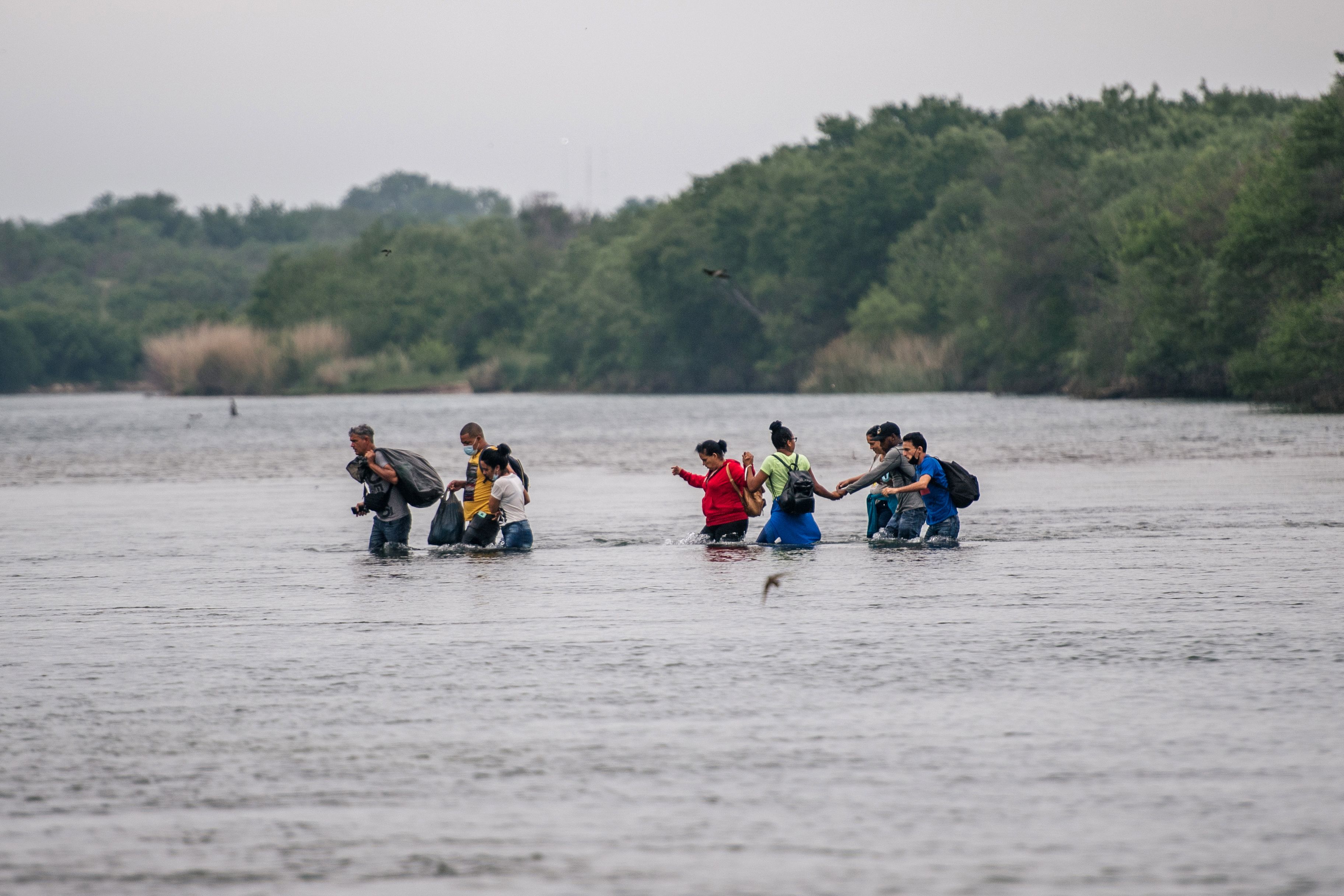 Mexicans Crossing The River