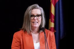 In this Dec. 14, 2020, file photo, Arizona Secretary of State Katie Hobbs addresses the members of Arizona's Electoral College in Phoenix.