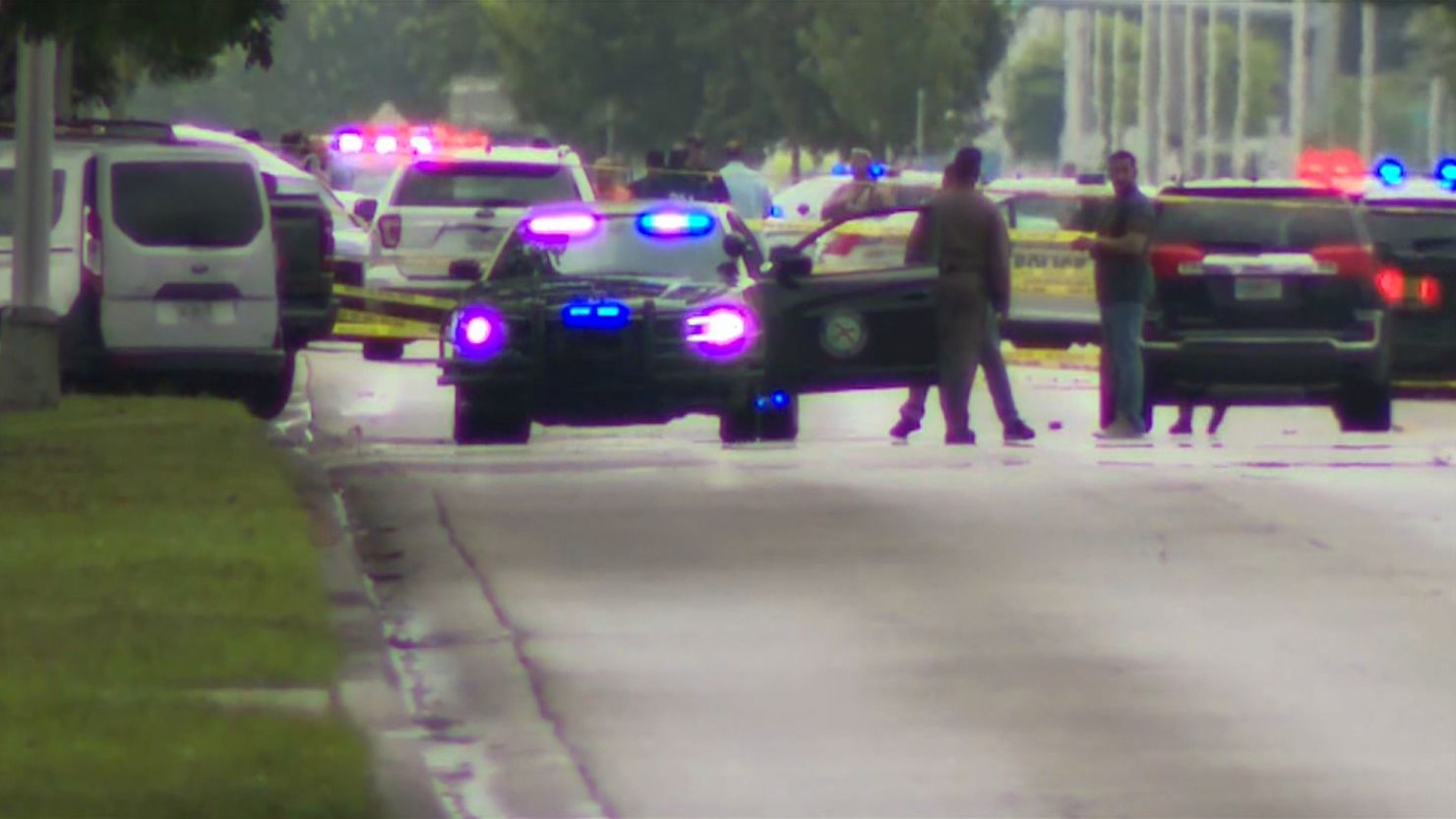 Two Doral, Florida, police officers were shot outside a Miami-Dade police station. 