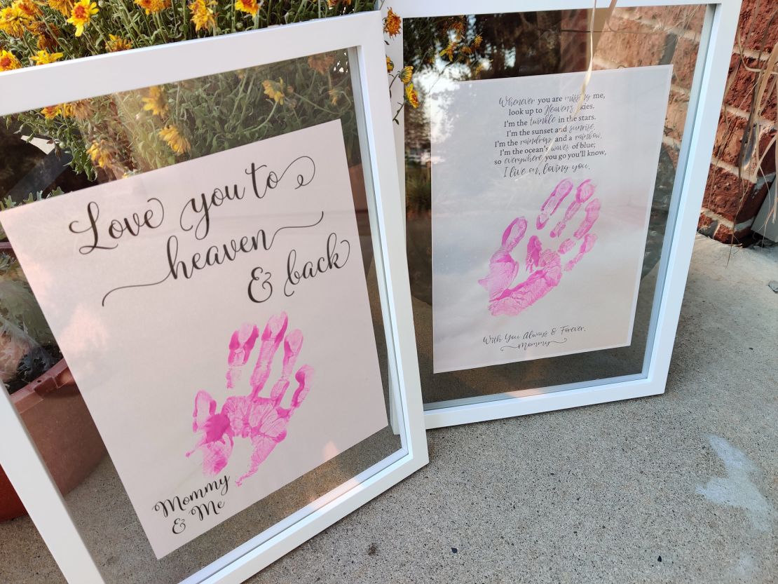 Emily's handprints on a photo Schwartz made to give Carmen once she is older.