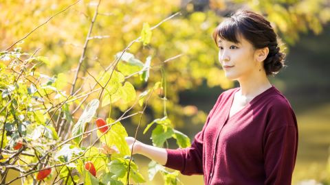 Japan's Princess Mako, the eldest daughter of Crown Prince Akishino and Crown Princess Kiko, strolls in the garden of their Akasaka imperial property residence in Tokyo on October 6.
