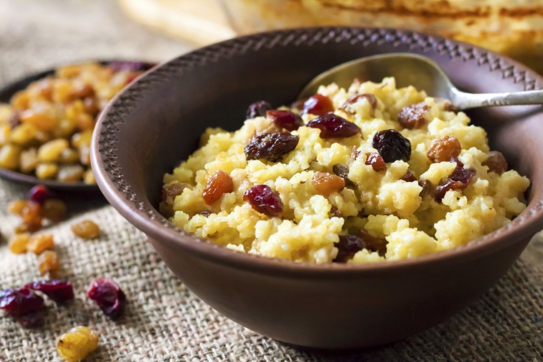 This sweet millet porridge is made with raisins and dried cranberries.