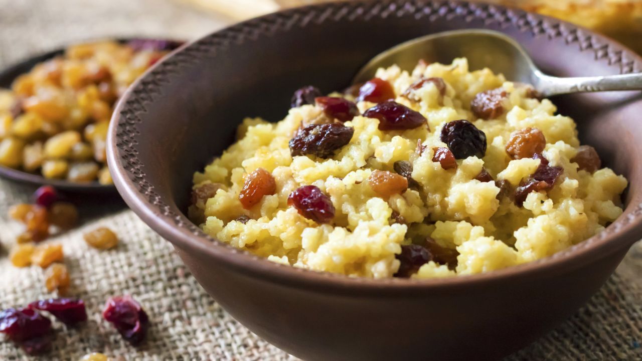 This sweet millet porridge is made with raisins and dried cranberries.