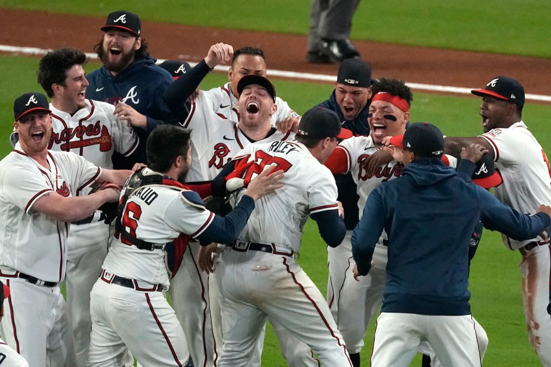 Atlanta Braves celebrate after winning Game 6 of baseball's National League Championship Series against the Los Angeles Dodgers Saturday, October 23, 2021, in Atlanta. 
