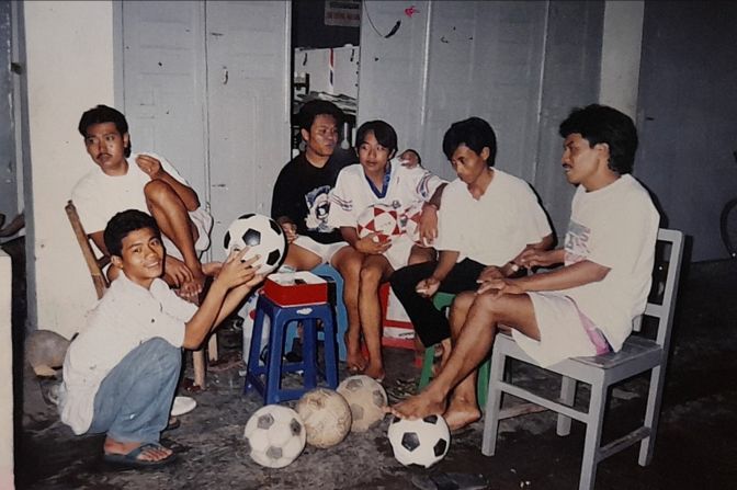 Friends and Football -- I'm from Indonesia, an archipelagic nation with a diverse population of tribes, races and religions. My Dad was a football enthusiast. When I was born in 1996, my Dad started a business selling football shirts, equipments and sporting goods. He held inter-village football cups for the people. I realized how special football's power of love is in uniting people of all backgrounds and developing tolerance. Not just between players, but also among the audience, including; moms, children, businessman, rickshaw drivers, bricklayers, community leaders and everyone. As seen in the photo when my dad, mom and I were preparing gifts for the lucky audience. Our diversity is an advantage -- it helps us learn to understand one another on and off the field. My Dad is no longer with us, but his belief that football unites will always be guarded and I will preach it to the world.