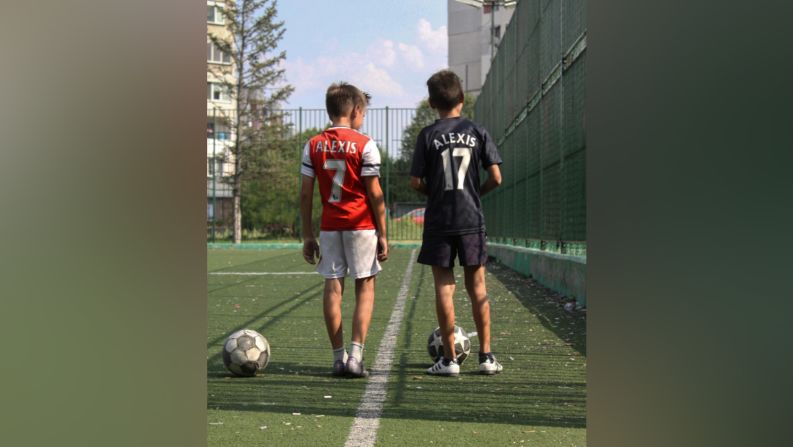 The name is not Alexis. It's Football. And the number isn't 7 or 17. It's millions. Both boys in the picture are young Bulgarian football players. One of them has a red scar covering half of his face. Different from the other children and often stared and pointed at, he finds comfort in a place dominated by acceptance -- Football. And therefore, the picture isn't showing any faces -- only the same passion. No scars -- only love. And two boys with a ball on a small pitch in one of Sofia's neighbourhoods. Now look at the picture again. Can you tell which boy is different? And can you tell what has brought them together?
