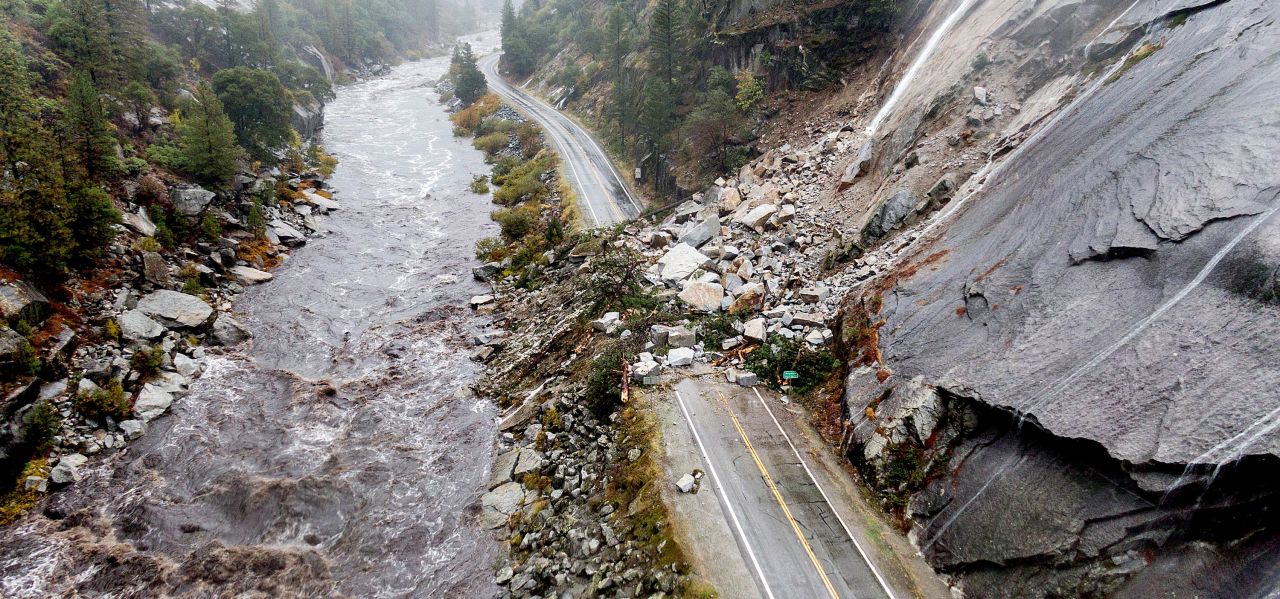 Rocks and vegetation cover Highway 70 following a landslide in Plumas County, California, on Sunday, October 24. Heavy rains blanketing Northern California created slide and flood hazards in land that has been scorched by wildfires. 