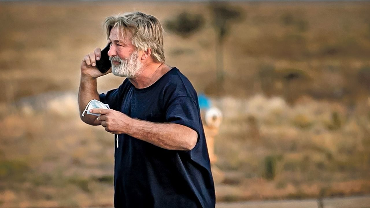 A distraught Alec Baldwin is seen in the parking lot outside the Santa Fe County Sheriff's Office after the shooting.
