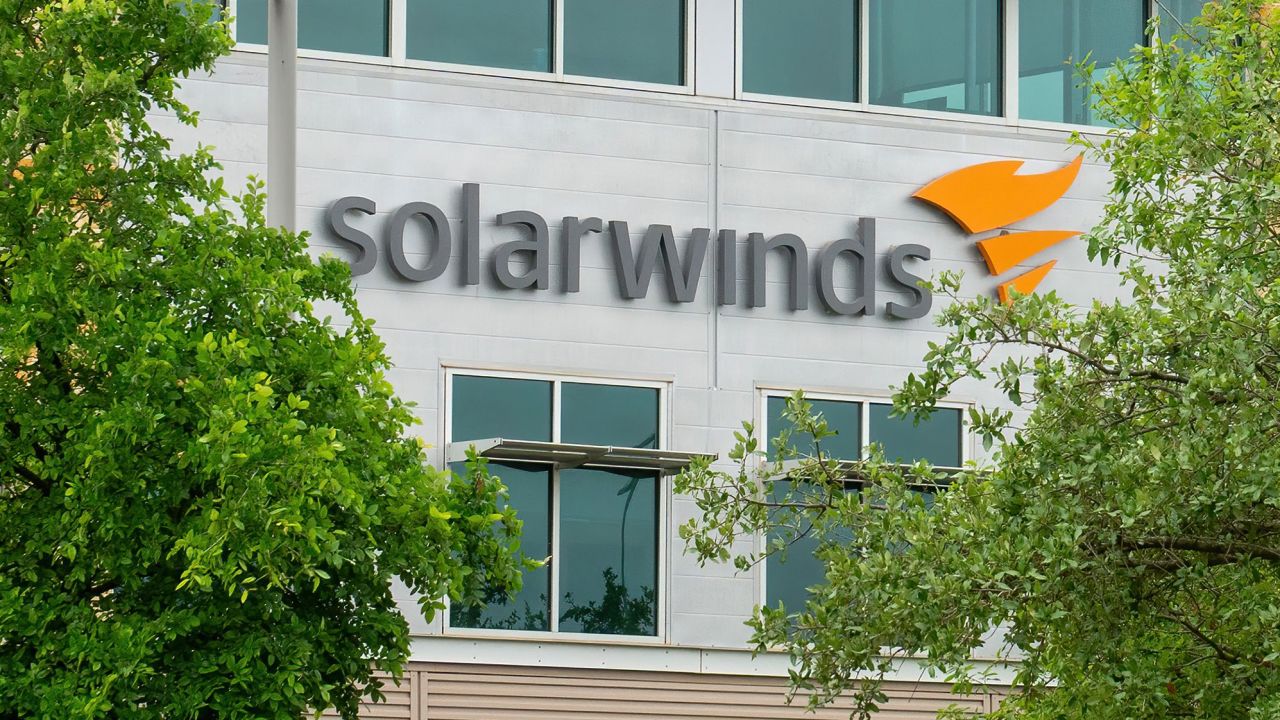 The SolarWinds Corp. logo is seen on a sign at the headquarters in Austin, Texas on April 15, 2021