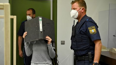 Jennifer W. arrives for her trial in Munich, Germany.