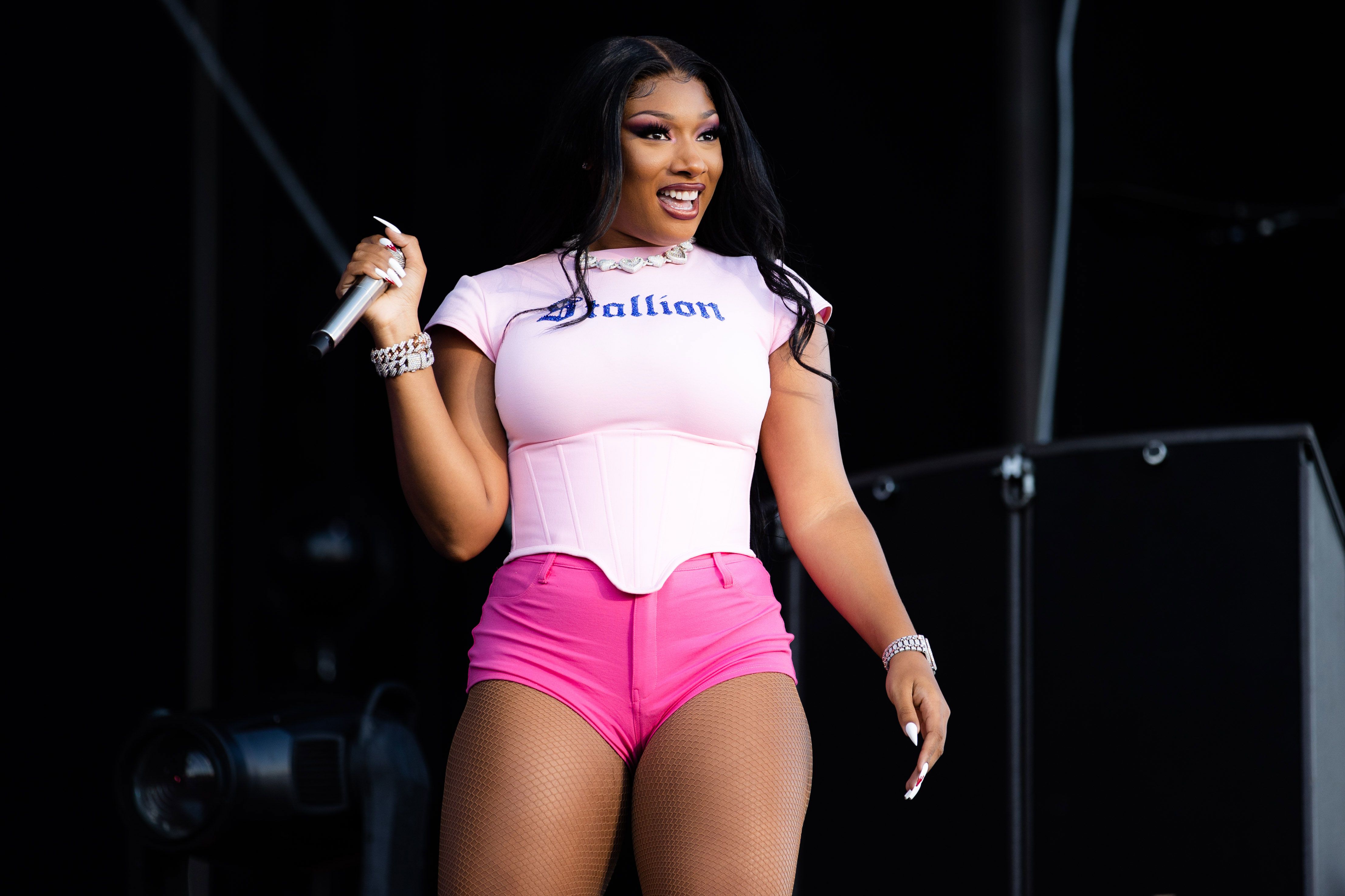 Megan Thee Stallion - "These kettlebell workouts are hard af, but they get the job done"