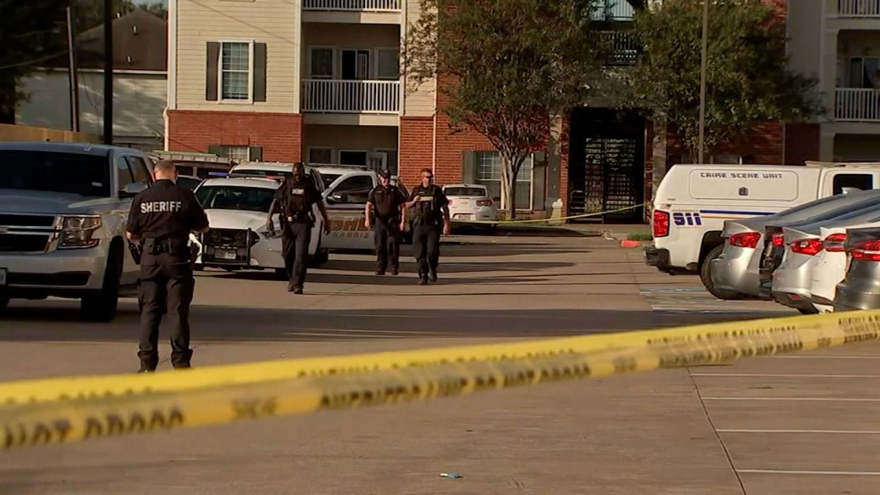 Police respond to the Houston apartment complex where the children were found.