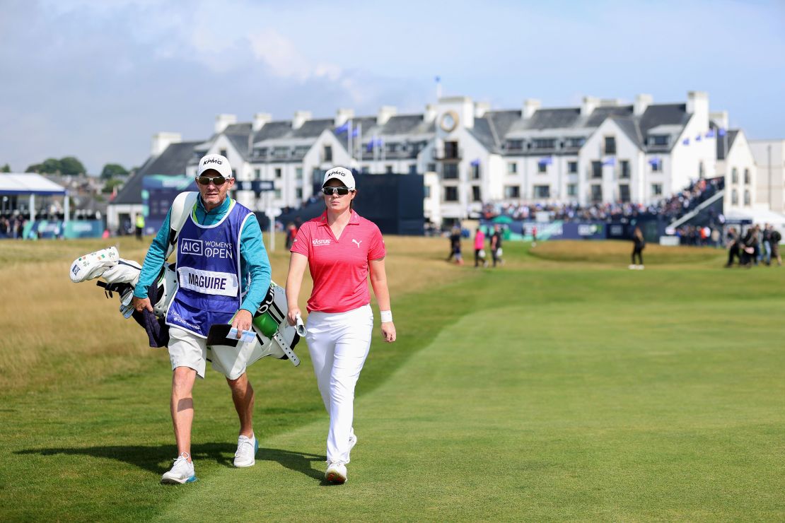 Maguire walks down the first hole with her caddie during the final day of the Women's Open at Carnoustie Golf Links.
